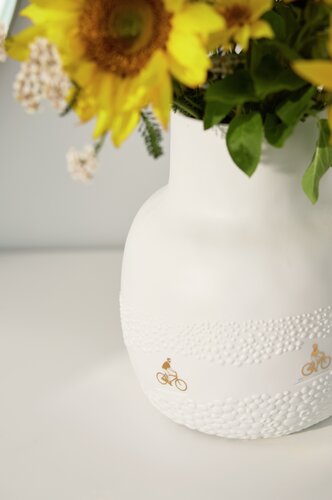 Vase Drive à travers le champ de fleurs Räder