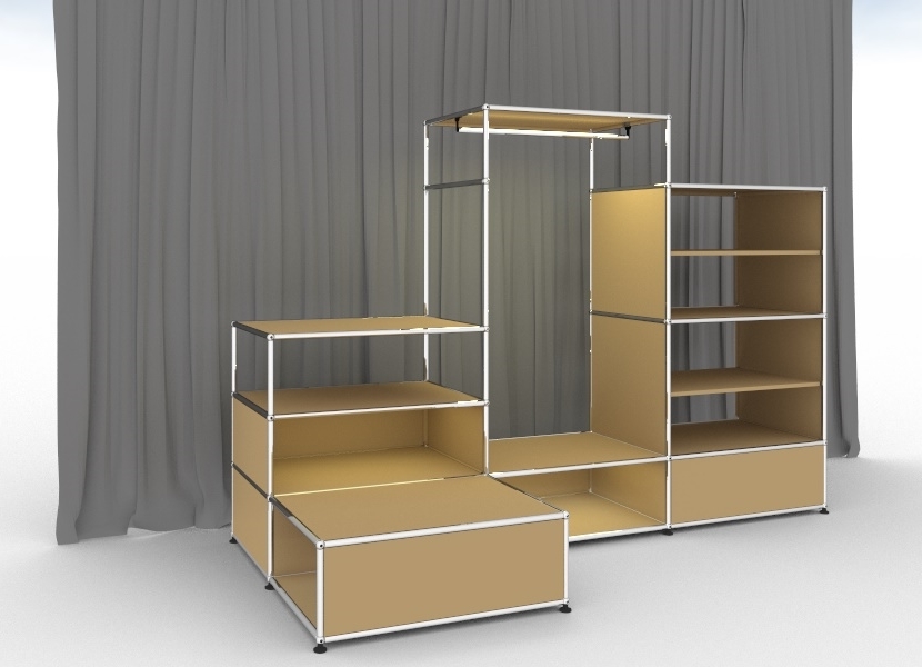 Beige USM Haller Garderobe mit Beleuchtung, Regalen und Kleiderstange vor grauem Hintergrund.