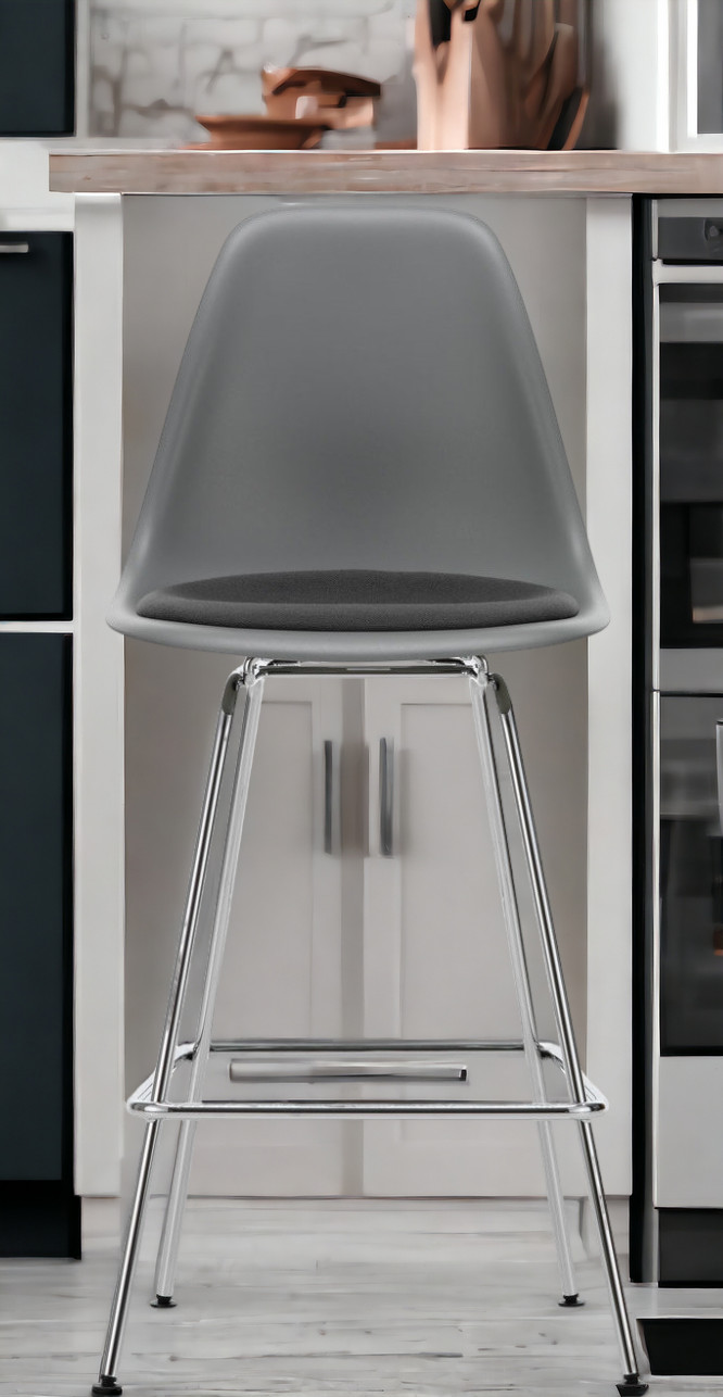 Eames Plastic Bar Stool Tabouret de bar moyen avec coussin d'assise Vitra