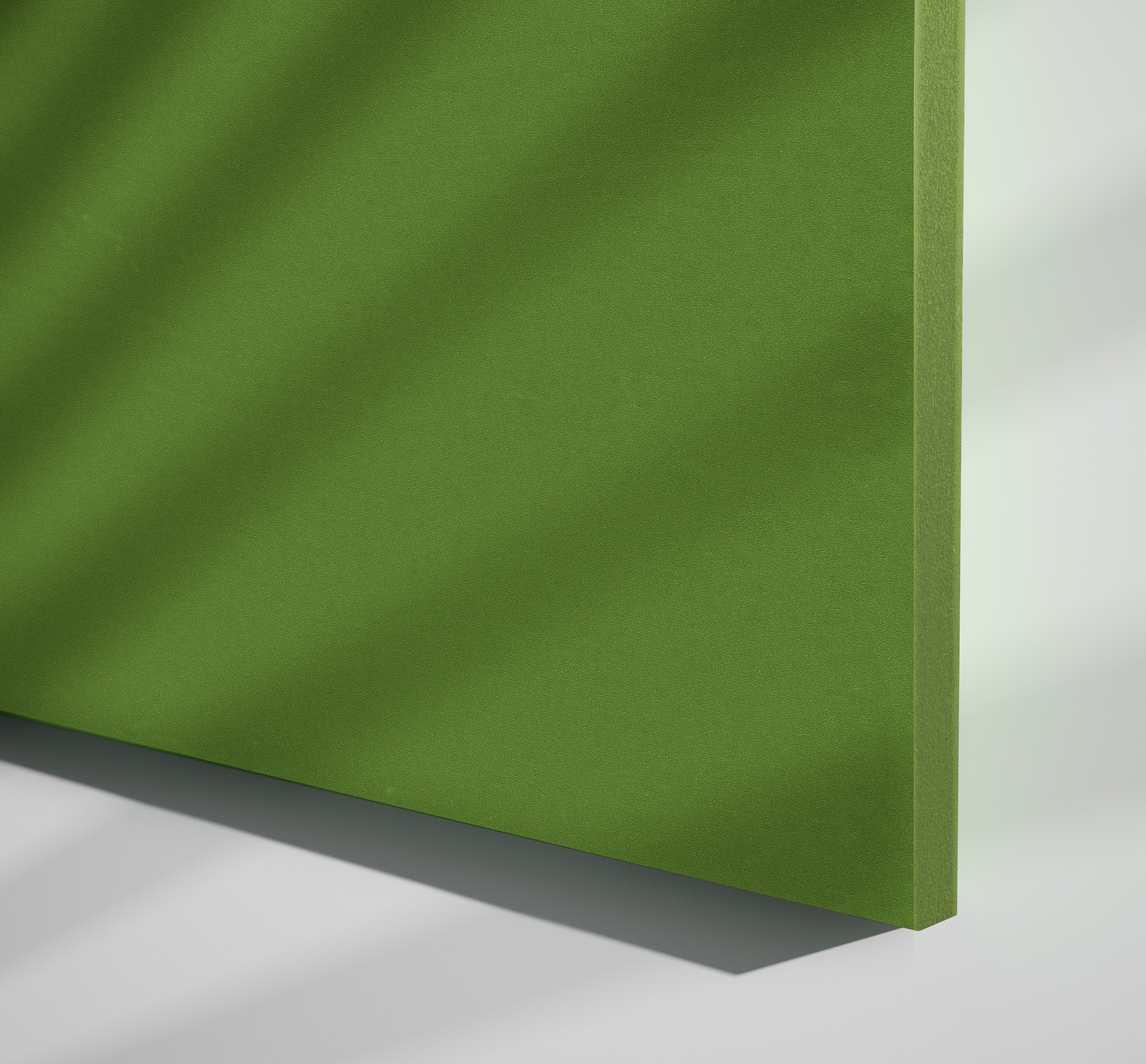 Grünes Terio Akustik Panel von Palmberg für Wandmontage zur Schallabsorption und Raumakustikverbesserung.