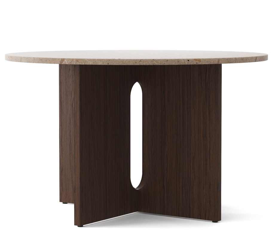 Androgyne Esstisch mit runder Sandsteinplatte und dunkel gebeiztem Eichenholzfuß mit Aussparung.