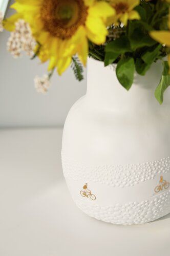 Vase Drive à travers le champ de fleurs Räder