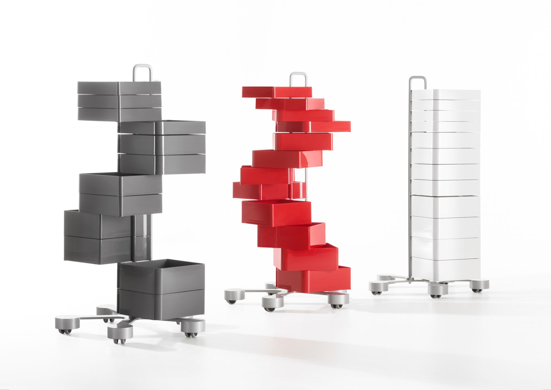 Spinny Schubladenelement mit Rollen in Rot, Grau und Weiß. Moderner Rollcontainer für Büro und Zuhause.