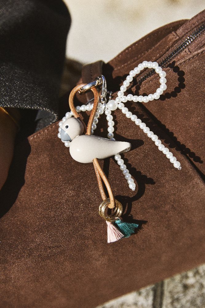 Porte-clés Oiseau Beige Métal Doré et Cuir Naturel Kay Bojesen