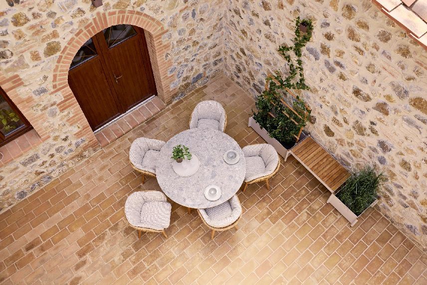 Aspect Table ronde d'extérieur Table Cane-Line 